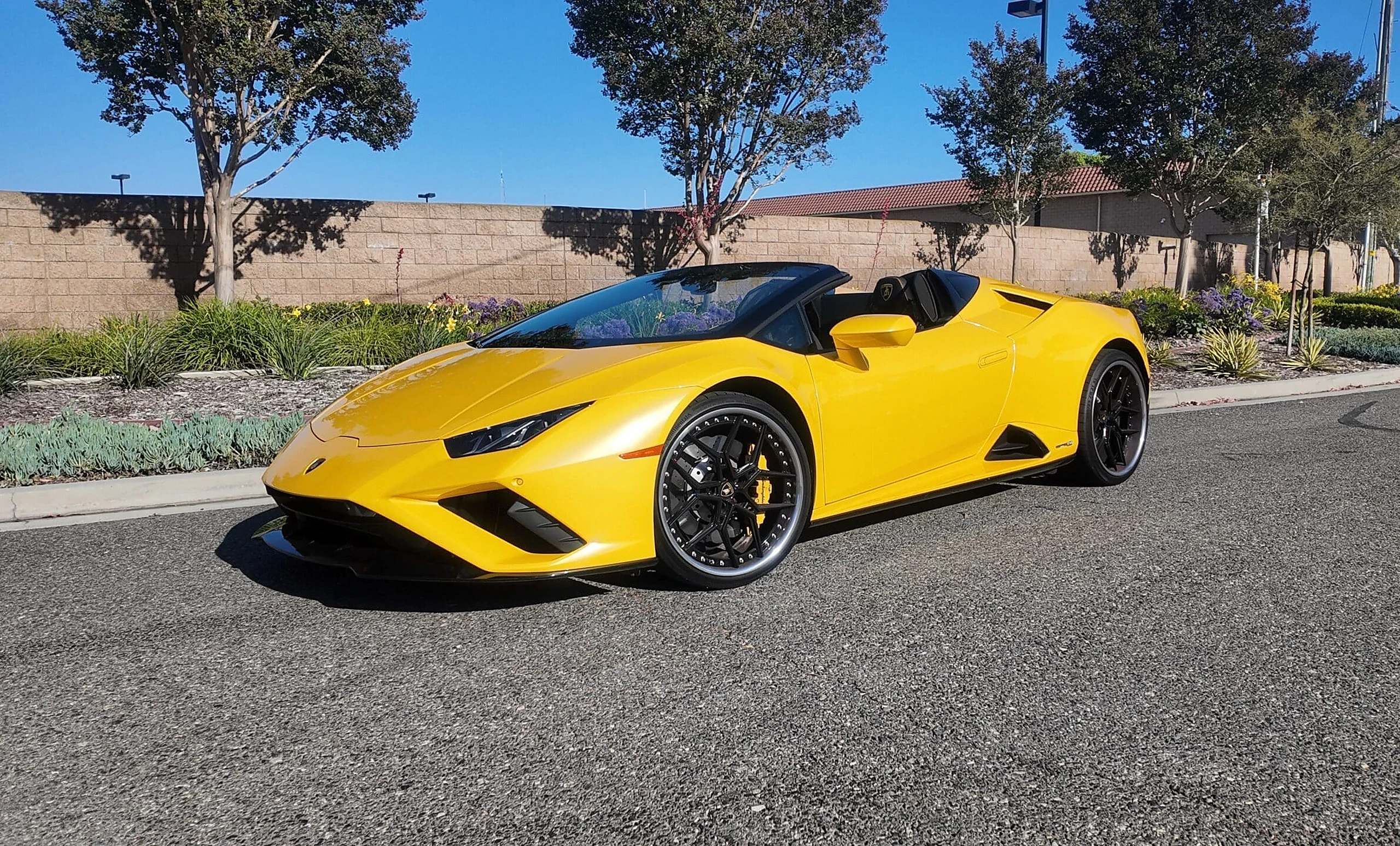 Lamborghini Huracán EVO Spyder exterior for multi-car exotic rental coordination